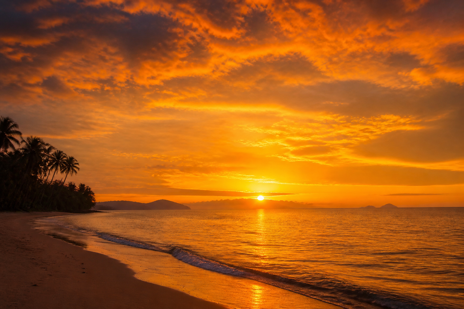 Warm sunset sky over Khao Lak beach